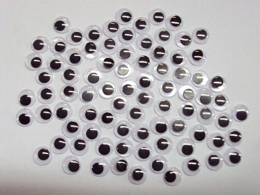 Ojos móviles redondos adhesivos negros 7 mm.