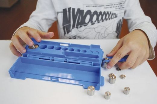 Balança de precisió amb peses llautó