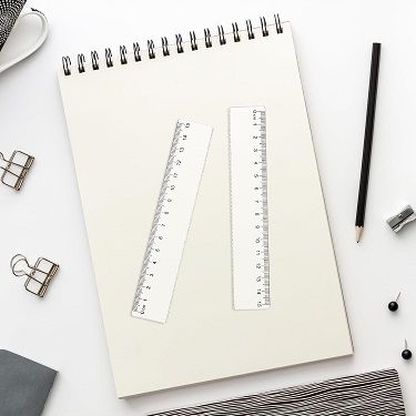 Regla plàstic 311/15 cm.